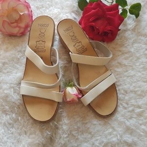 Nikos wedges sandals in white.